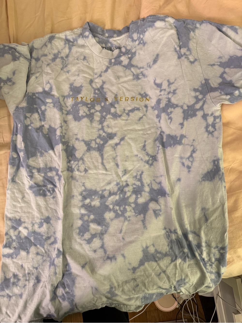 Official Taylor Swift (Taylor’s Version) Tie-Dye Tee with Gold Lettering